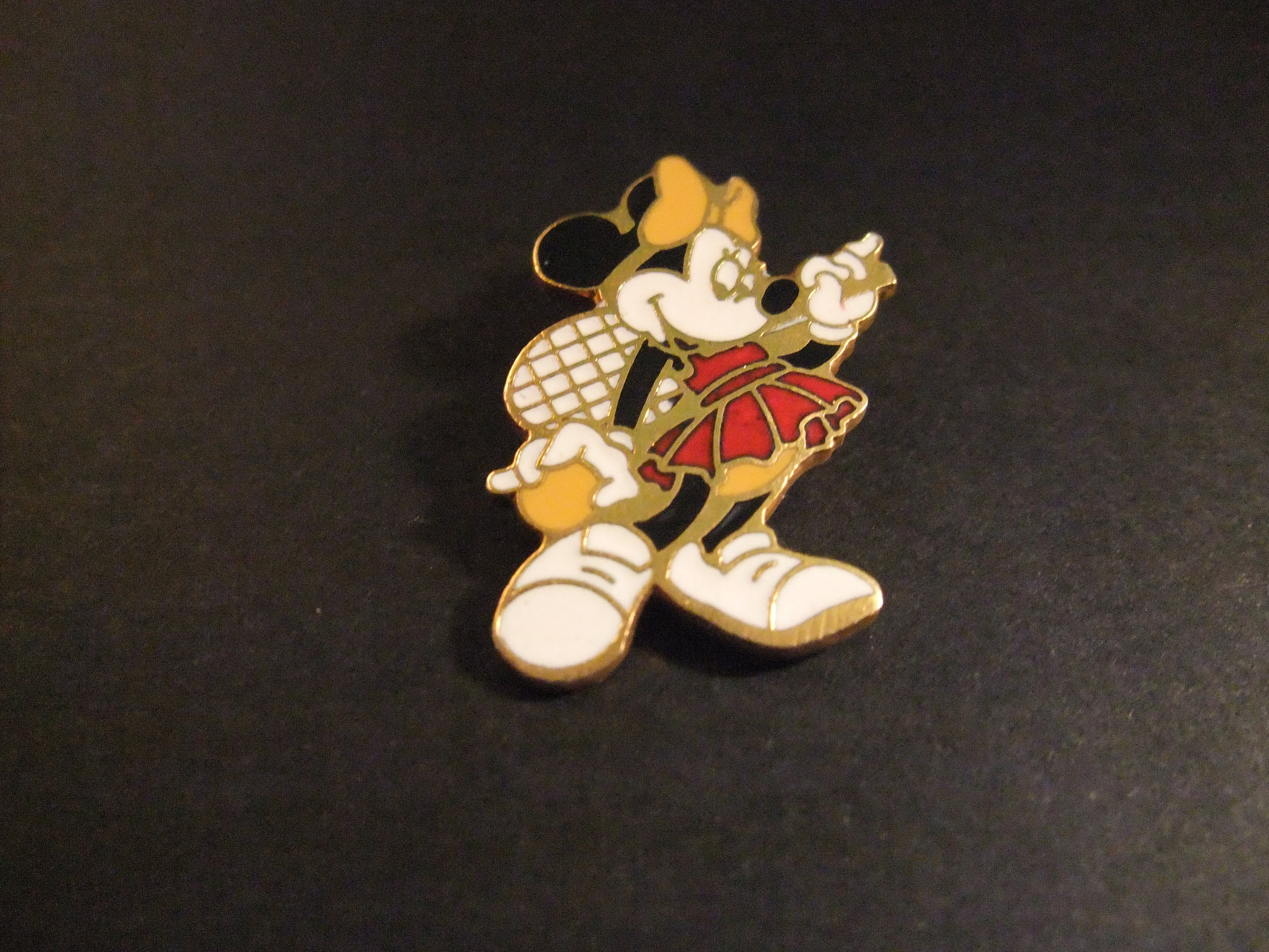 Minnie Mouse (vaste vriendin van Mickey Mouse) speelt tennis